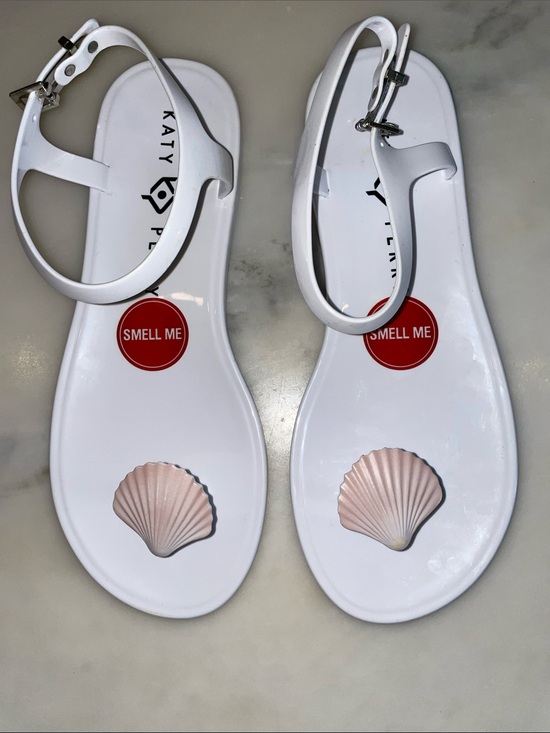 Katy Perry Collections Shoes - Katy Perry Collections White Jelly Sandals with Pink Shell Embellishments